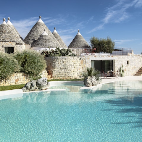 Find peace and relaxation while lounging by the pool