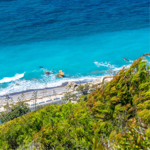 Spend a day paddling at Paralia Plimmiriou – it's a short drive