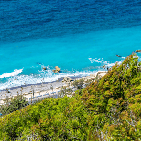 Spend a day paddling at Paralia Plimmiriou – it's a short drive