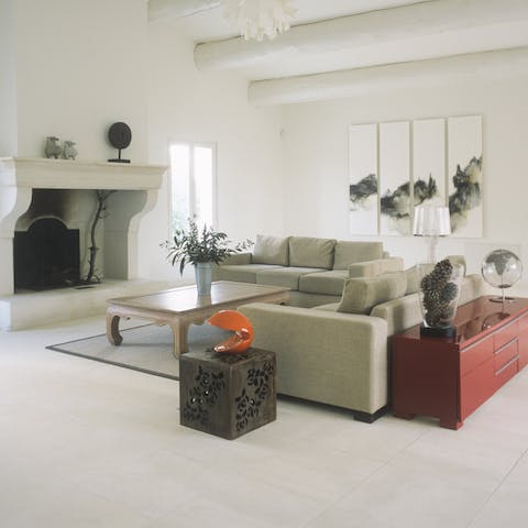 Raise the level of fireside discourse in this artsy living room