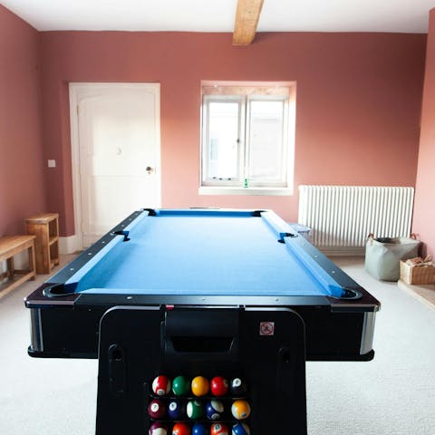 Play a game of table tennis or pool in this farmhouse's games room