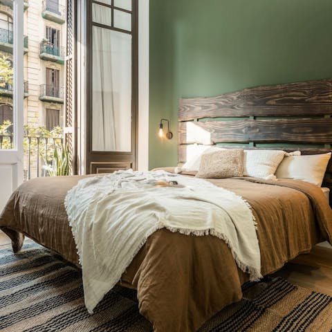 Wake up to beautiful Eixample views from the master bedroom's balcony