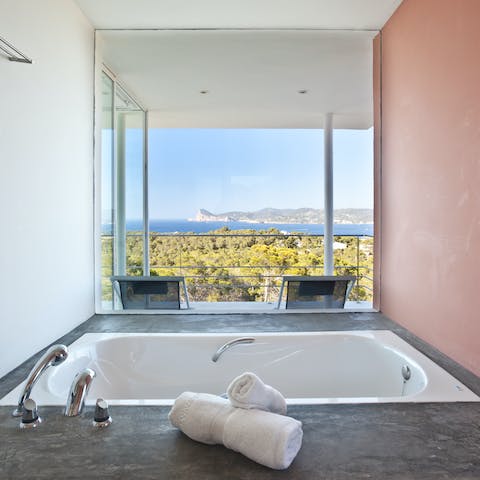 Look out to the gorgeous vista while taking a bubble bath