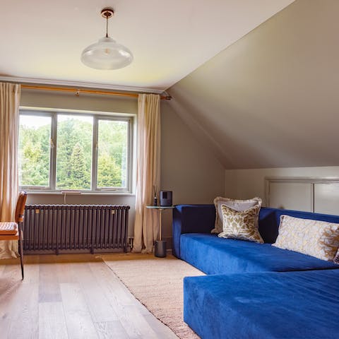 Wake up to views across the tree–tops and enjoy cosy mornings on the sofa
