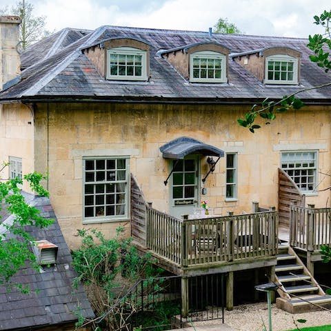 Savour morning coffees on the terrace overlooking lawns leading to the castle