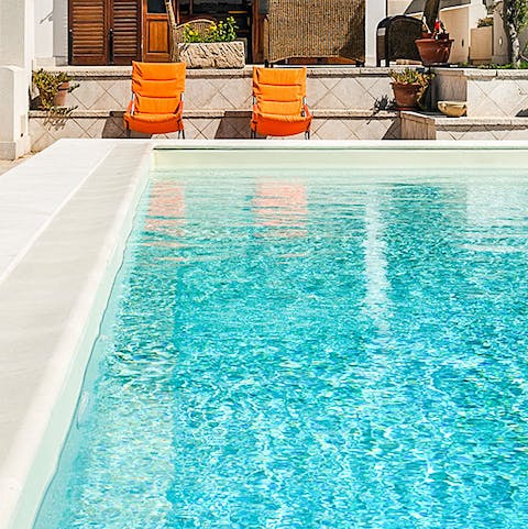 Relax on the loungers before jumping in the pool to beat the Italian heat