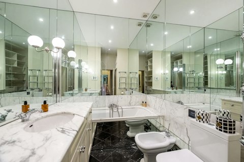 Luxuriate in a generous bathtub after a day exploring Knightsbridge