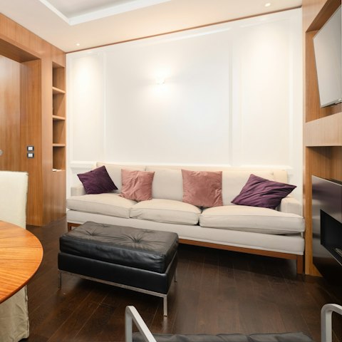Curl up on the cosy sofa after a long day on your feet