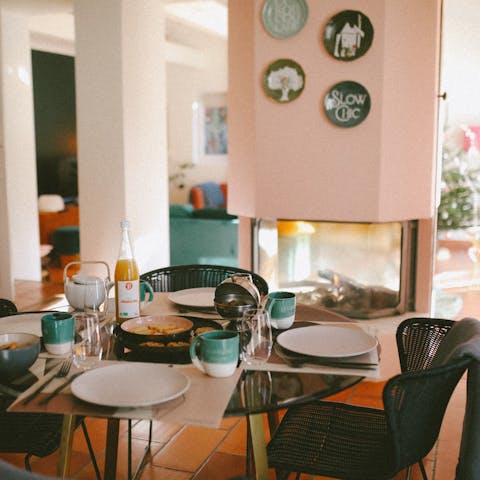 Gather around the fire for a cosy evening meal, family style