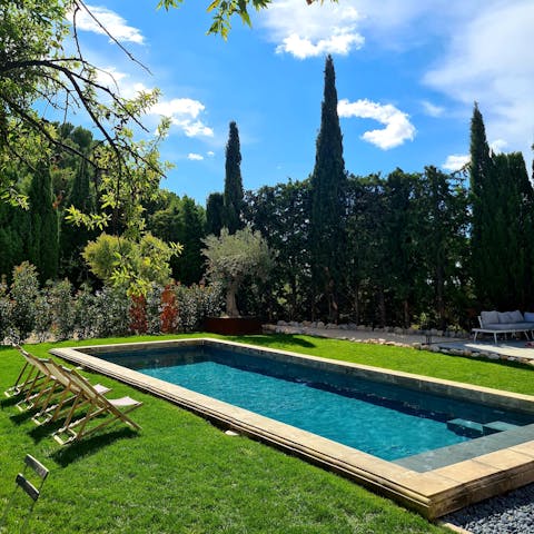 Slip into your private pool for a morning swim under the cypress trees