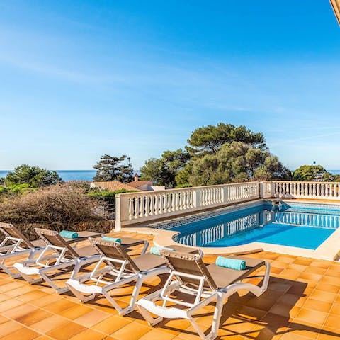 Spend lazy days lounging by the pool and admiring the views