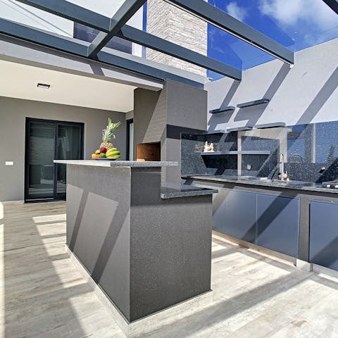 Shake up some cocktails at the terrace bar