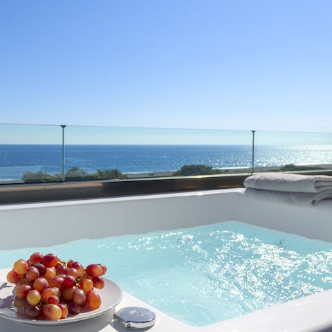 Sink into the private hot tub