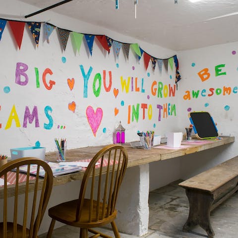 Keep little ones entertained in the "kid's cave" – a haven of activities