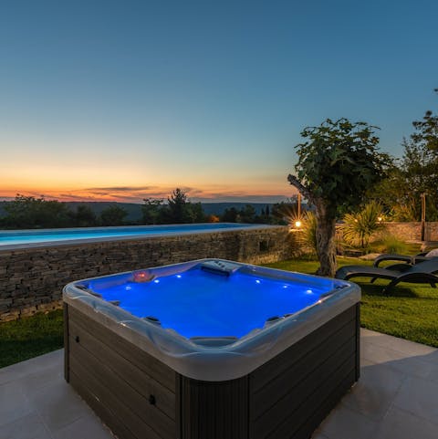 Watch the sunset from the hot tub