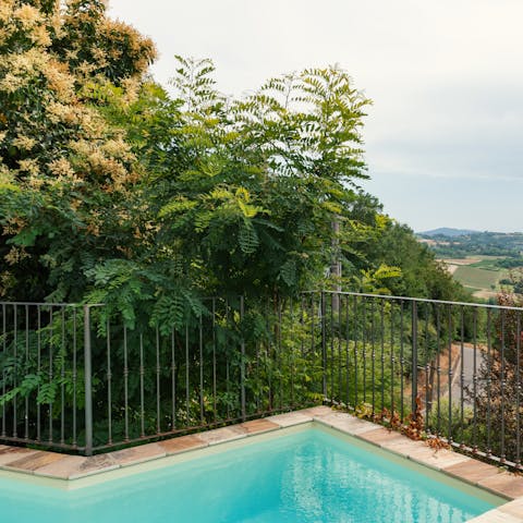 Cool off in the private pool with views of the countryside