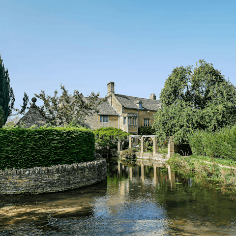 Reach the picturesque Bourton-on-the-Water in twenty minutes by car