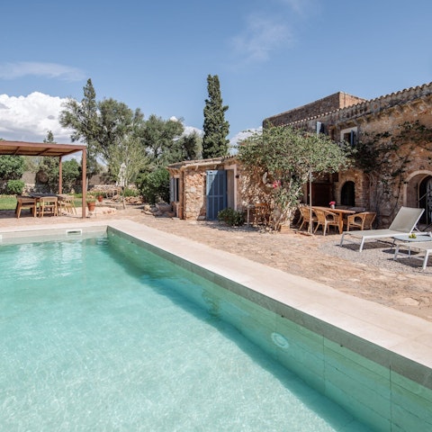 Sunbathe or dine by the private pool