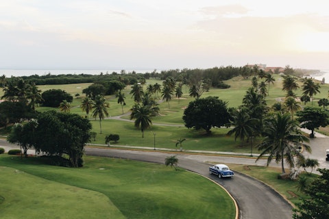 Tee off on world-class Caribbean golf courses framed by turquoise waters