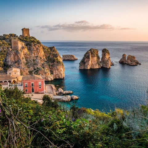 Stay in Sicily and explore the coastal city of Cefalù, 10 kilometres away