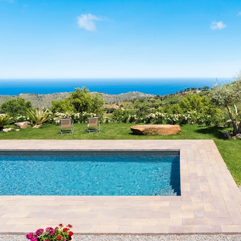 Admire the Mediterranean Sea views from the private pool