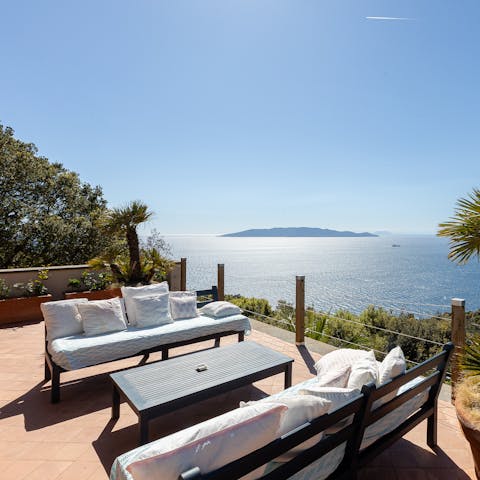 Soak up the views as you sip cocktails on the terrace