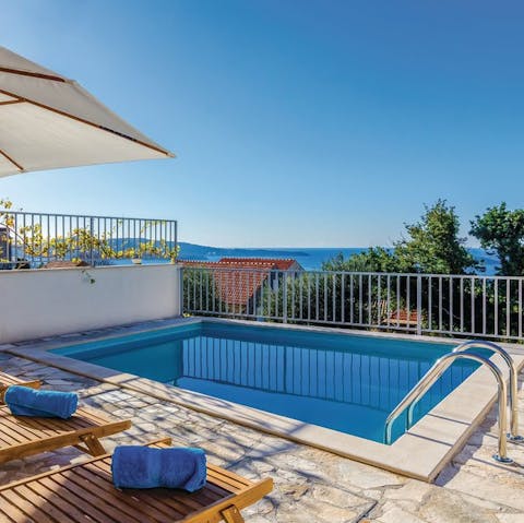 Spend afternoons splashing in the pool while admiring Adriatic views