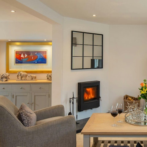 Cosy up by the fire with a good book and a glass of wine