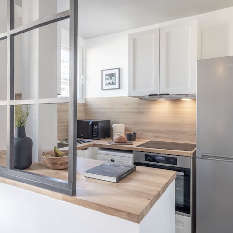 Prepare coffee and croissants in the cosy kitchen