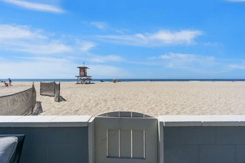 Step out to open sand and ocean stretching to the horizon