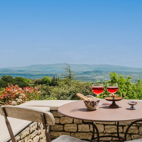 Watch the sunset as you sip a glass of French wine