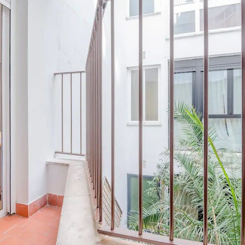 Sip your morning coffee from the main bedroom's luminous balcony terrace
