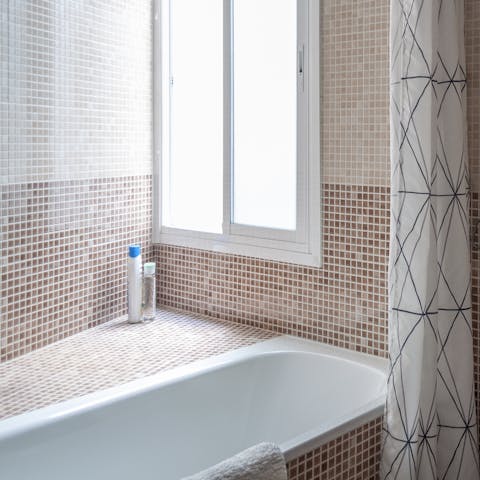 Unwind in the bathtub after an action-packed day discovering Madrid