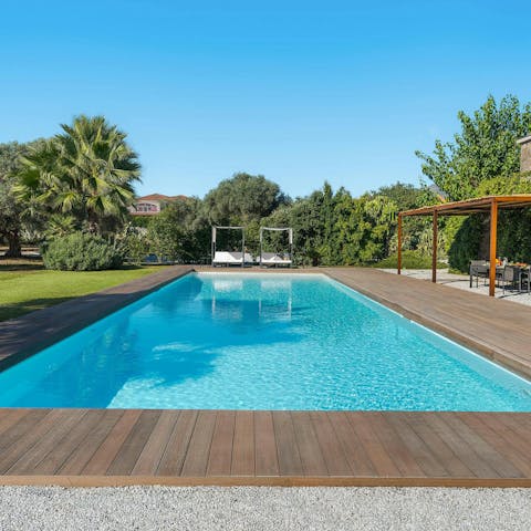 Enjoy blissful days swimming and lounging by the pool