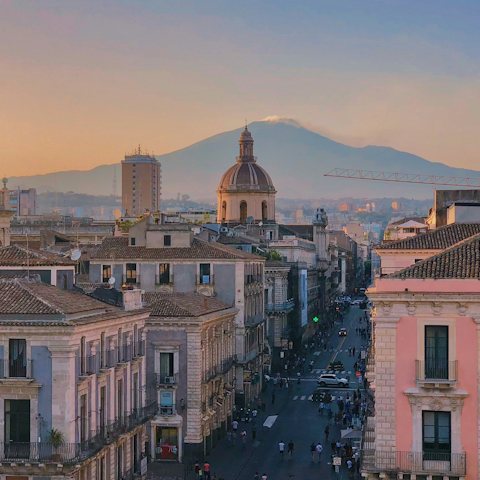Stay ten minutes from volcano views in vibrant Catania
