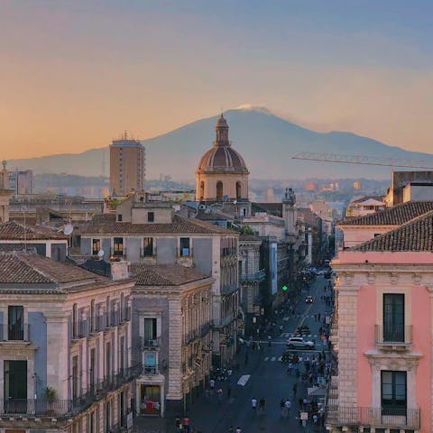 Stay ten minutes from volcano views in vibrant Catania