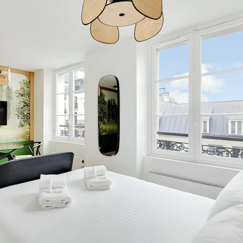 Wake up in the comfy bed to views of the rooftops