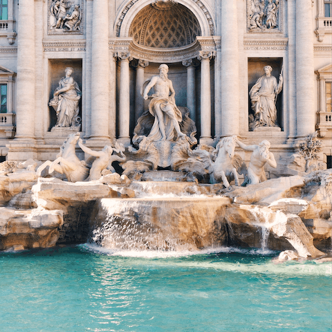 Make a wish at the Trevi Fountain, twenty minutes away on foot