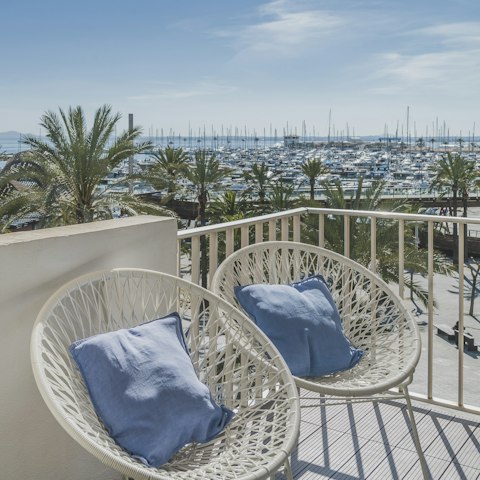 Relax with a glass of sangria in the comfortable wicker chairs