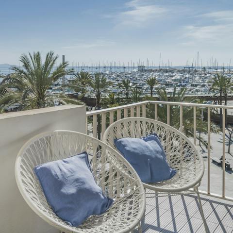 Relax with a glass of sangria in the comfortable wicker chairs