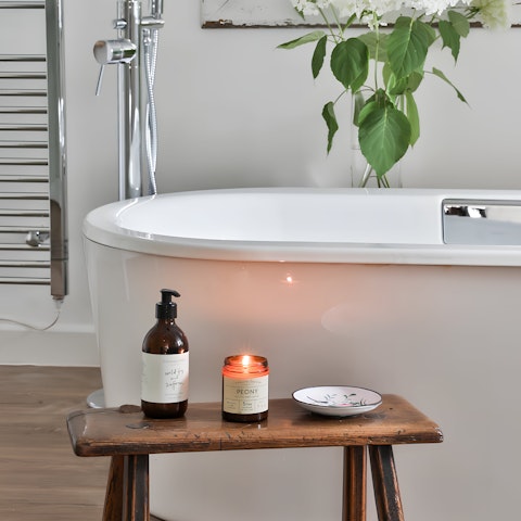 Unwind with a bubble bath after spending the day in the countryside