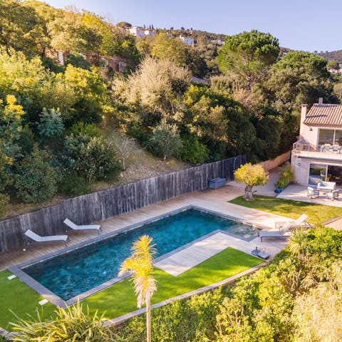 Enjoy lounging by your private pool on hot afternoons