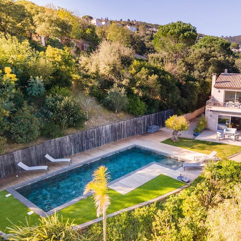 Enjoy lounging by your private pool on hot afternoons