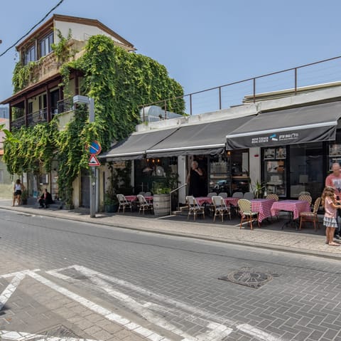 Explore the pavement cafes of Neve Tzedek, a five-minute stroll away