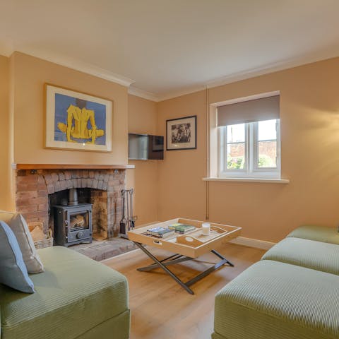 Warm up in front of the wood burner on a chilly evening