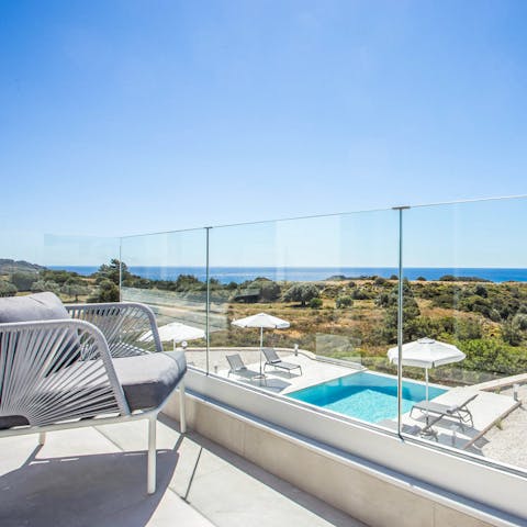 Retreat to the master bedroom's private balcony for romantic drinks