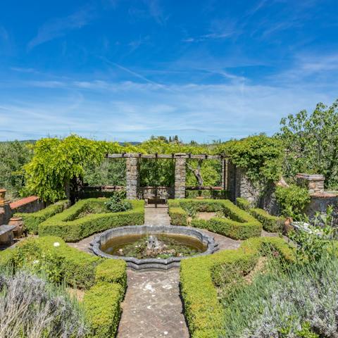 Soak up the Tuscan country air as you wander around the beautifully manicured gardens