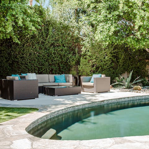 Relax in the shade by the poolside