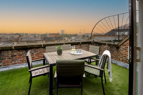 Admire the views from the terrace, a cocktail in hand