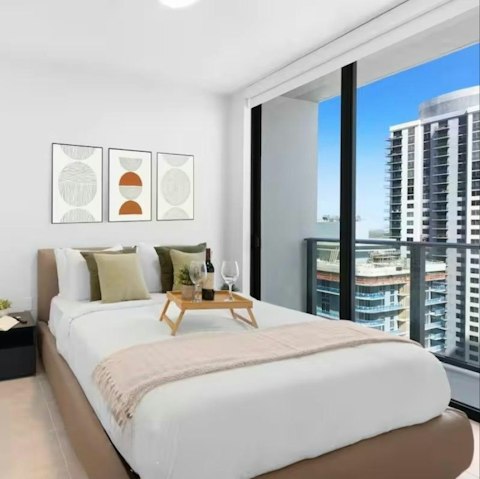 Wake to downtown Miami skyline views from the bedroom